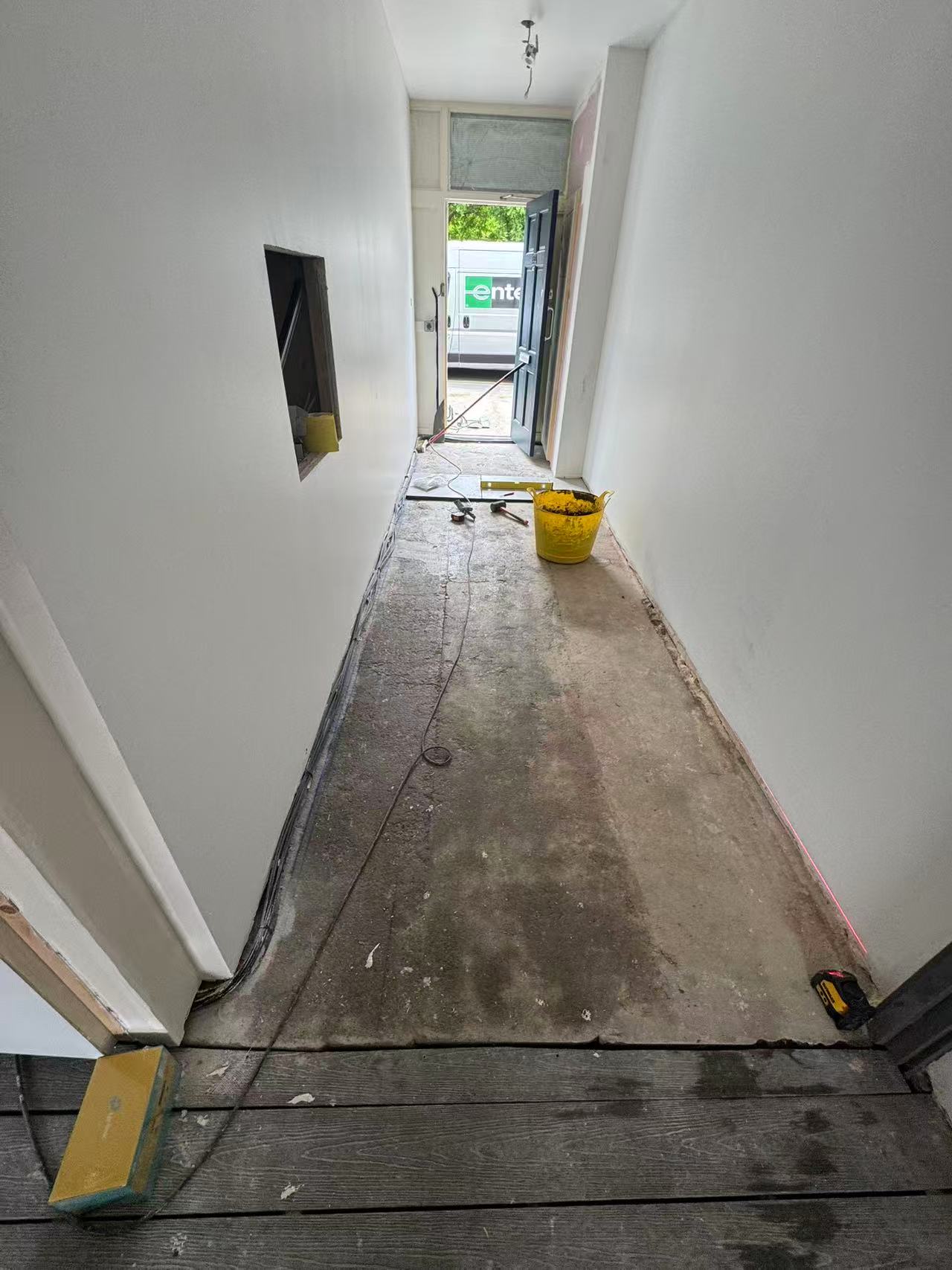 Hallway and ground floor porcelain tiling during full renovation — image 2