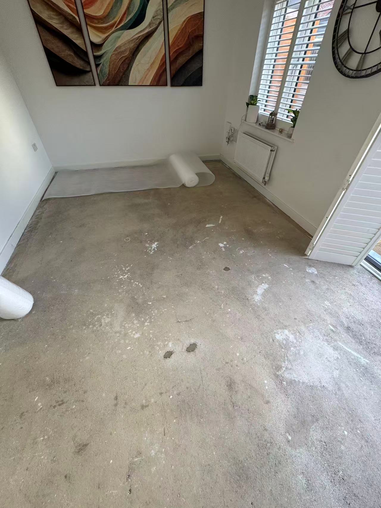 Whole-home laminate installation over a prepared subfloor — image 3