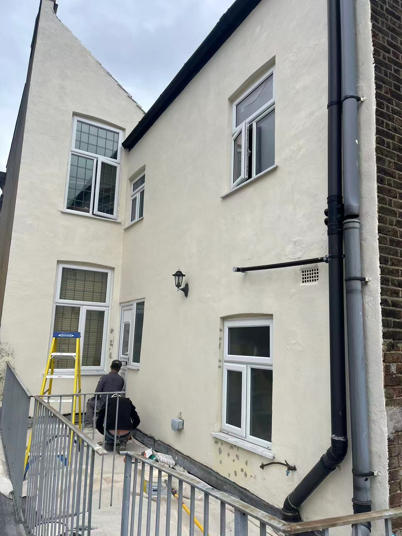 Exterior render repair and full repaint — image 4