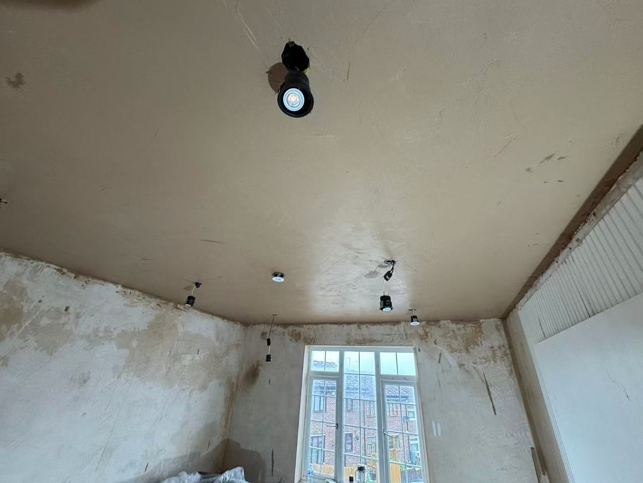 Full ceiling and wall replastering, residential living room — image 2