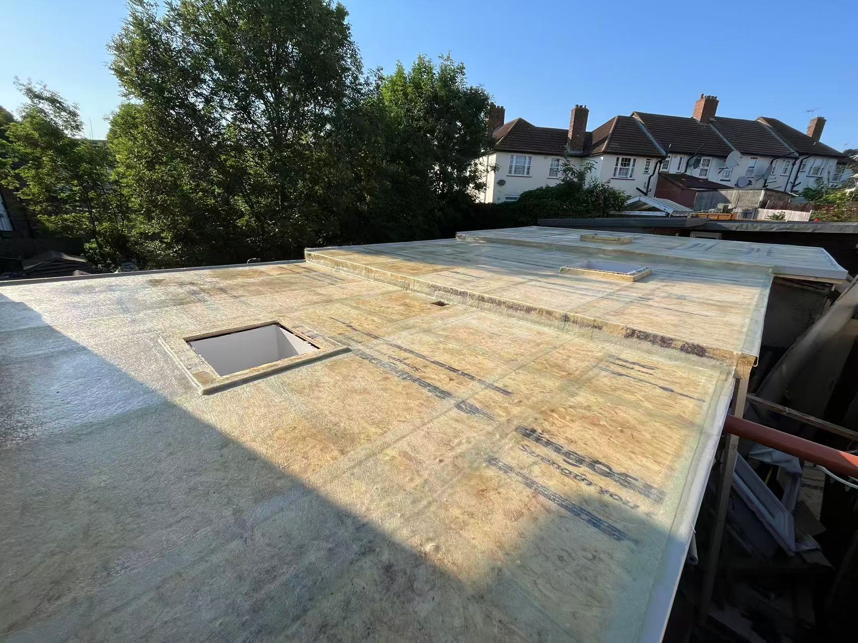 Full flat roof rebuild with GRP covering and new rooflights — image 4