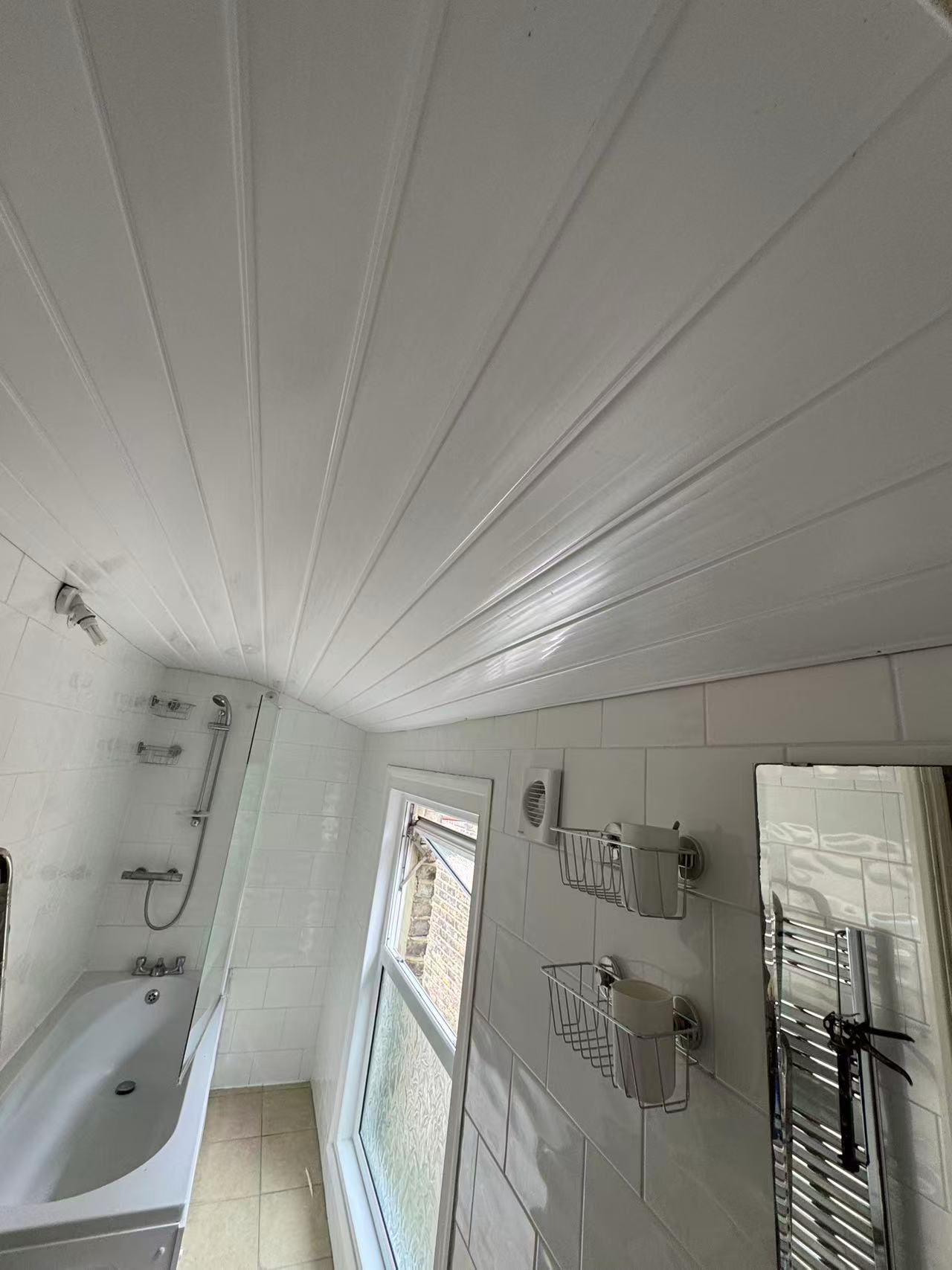 Bathroom ceiling refurbishment with PVC cladding — image 4