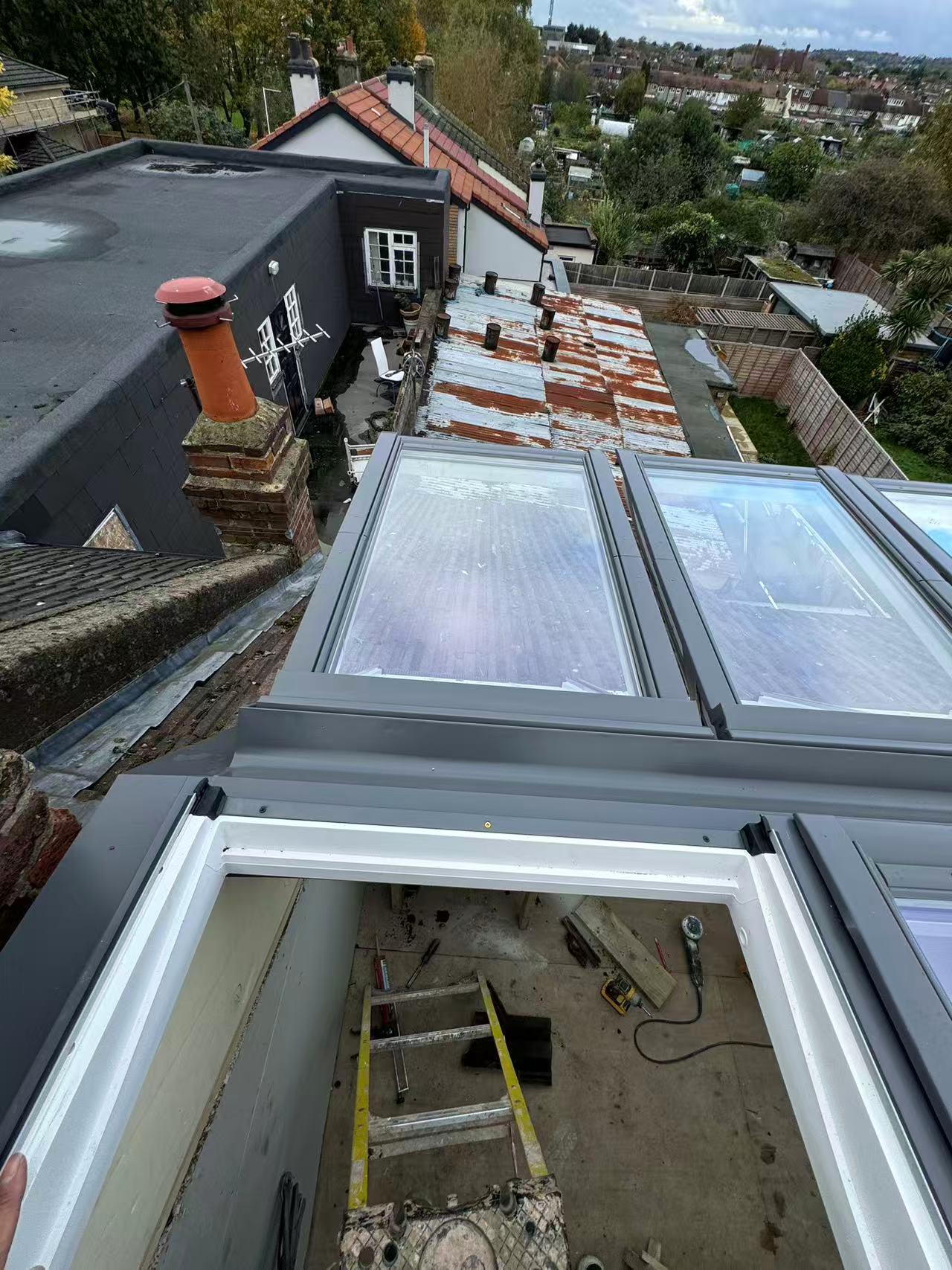 Full flat roof rebuild with GRP covering and new rooflights — image 2