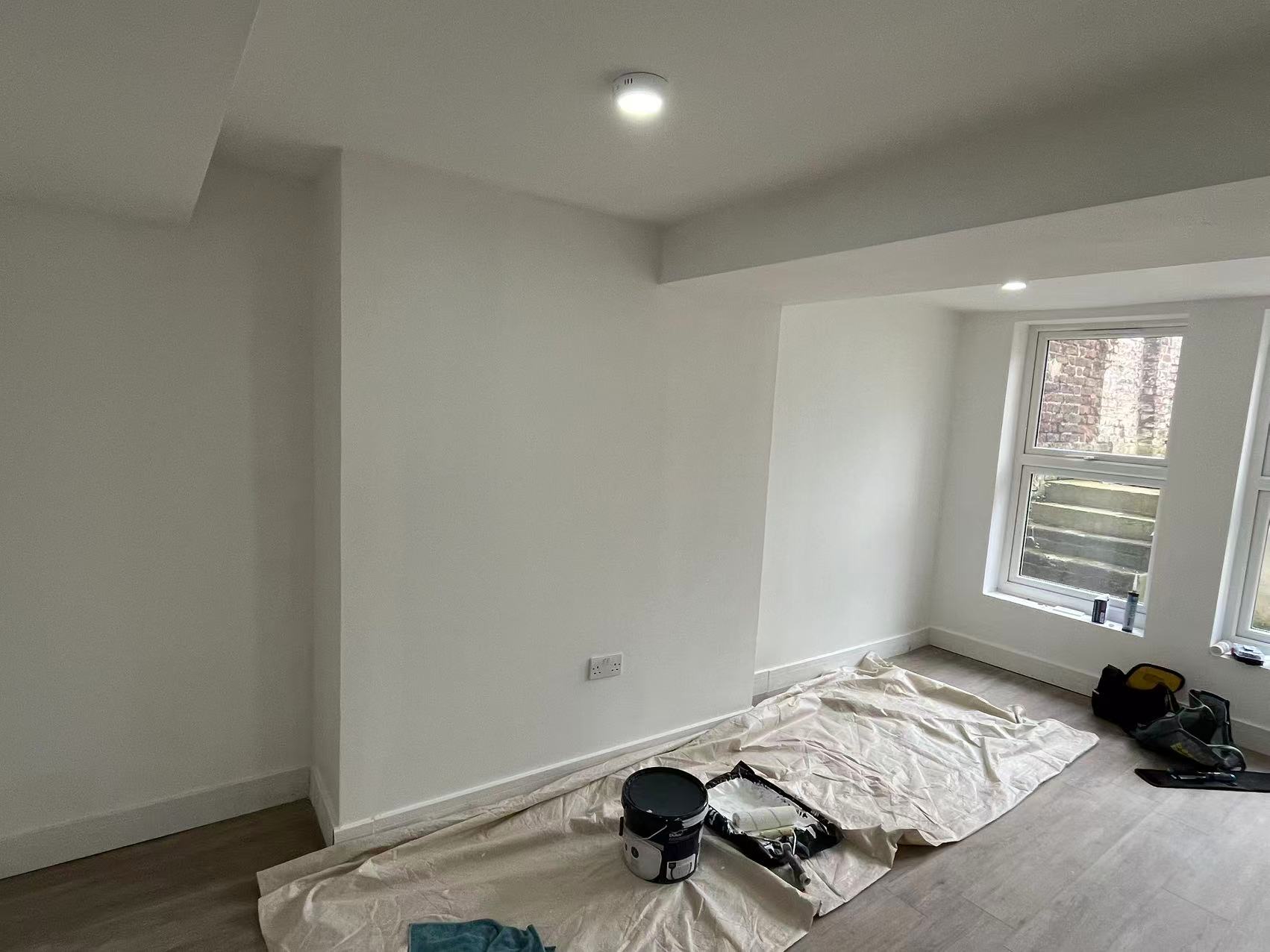 Reception room patch repairs and full repaint — image 1