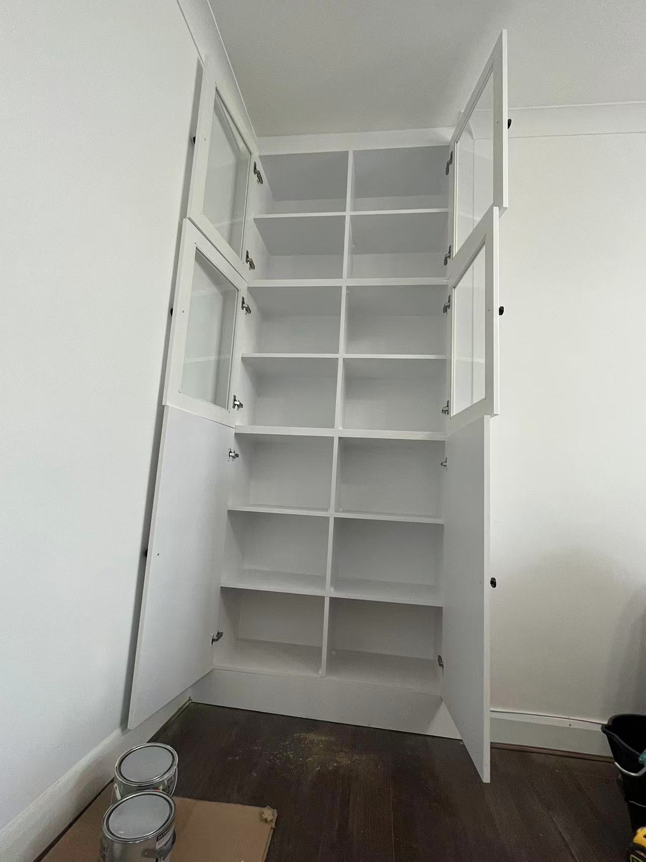 Painted glazed storage unit with black knob handles — image 2