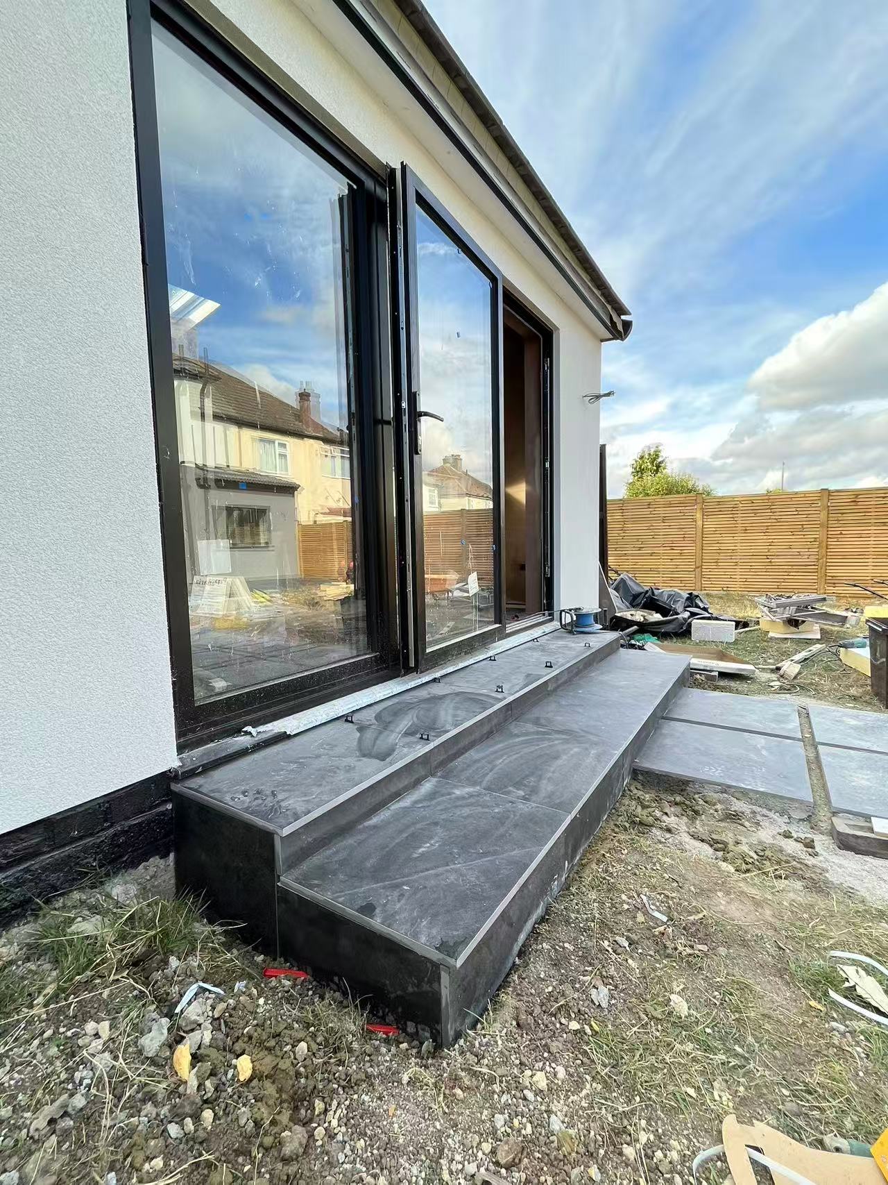 Wrap-around rear extension and garden room — image 4