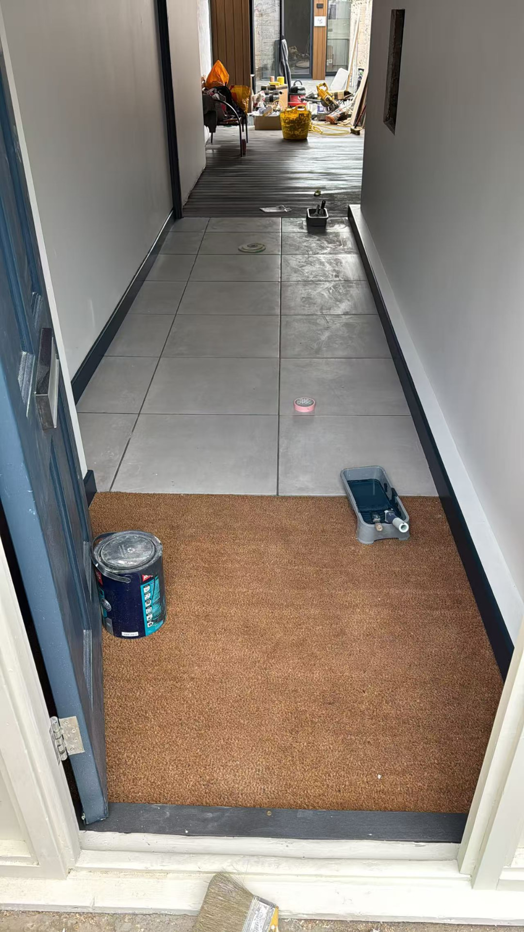 Hallway and ground floor porcelain tiling during full renovation — image 5