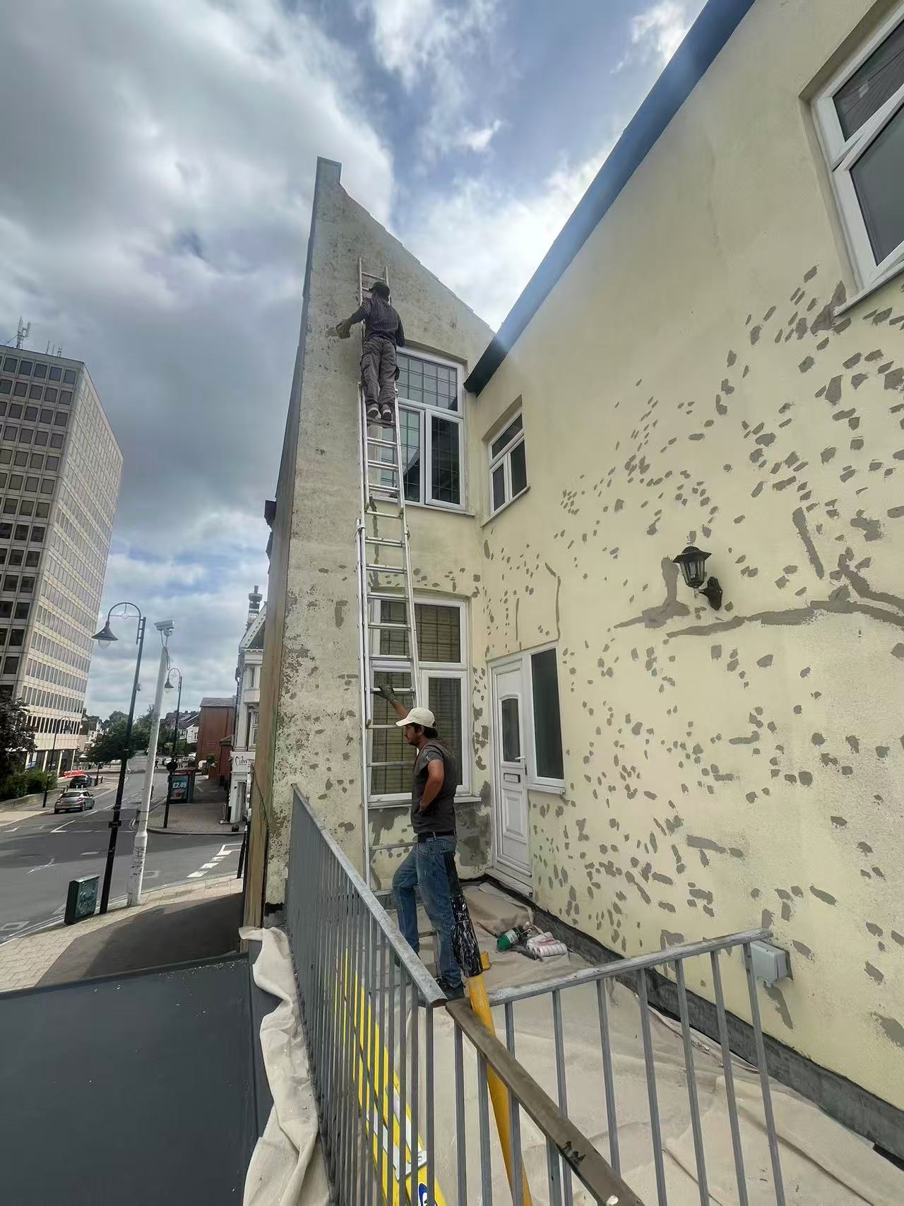 Exterior render repair and full repaint — image 2