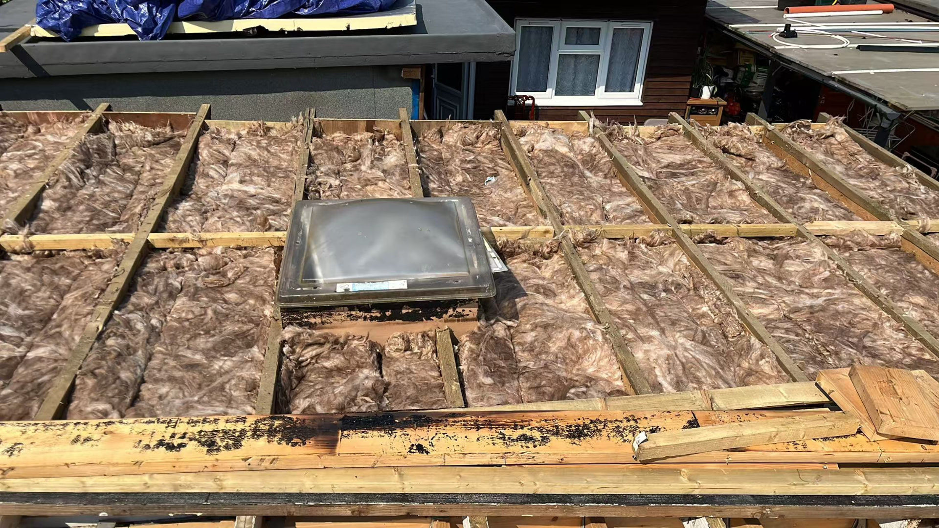 Full flat roof rebuild with GRP covering and new rooflights — image 1